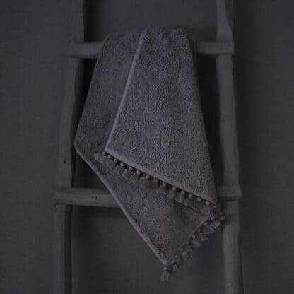 grey bath towel pompoms valerie barkowski