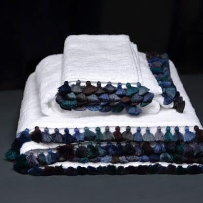 Bath towel with blue pompoms LAMU Blu : luxury embroidered bath linen