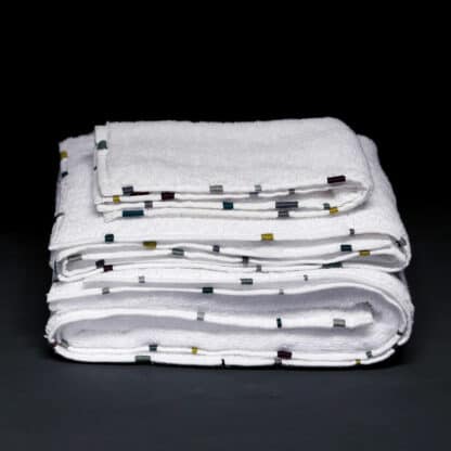 hand-embroidered white bath linen