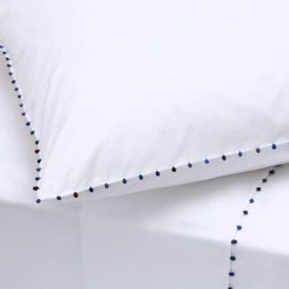 parure de lit blanche en coton peigné passementerie