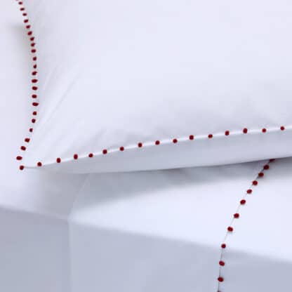 buy white bed linen with red trimmings