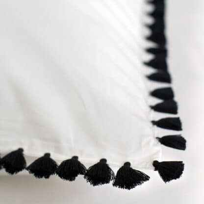 buy bed linen ilias with plain black pompons 1