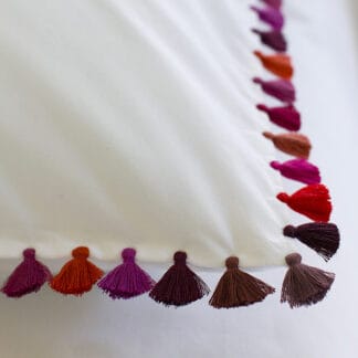 linge de lit pompons multicolores