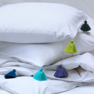 White bed linen coloured tassels TULUM Casapiedra handmade