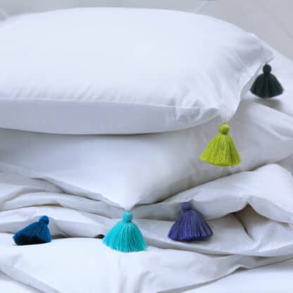 White bed linen coloured tassels TULUM Casapiedra handmade