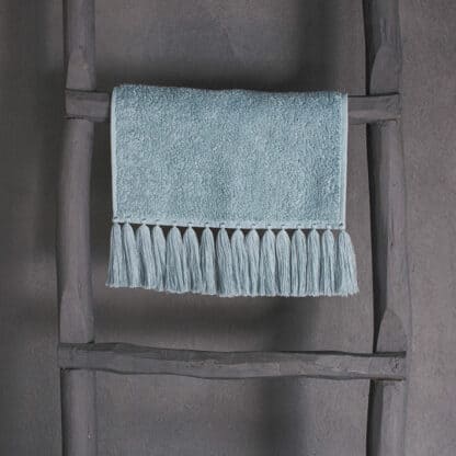 Luxury guest towel in pale blue terry with fringes