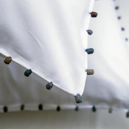 AYA white bed linen with trimming