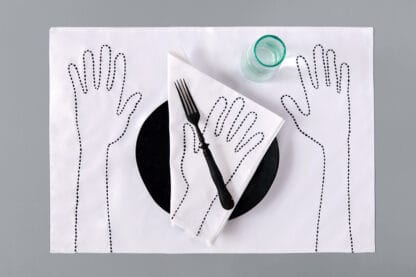 inviting embroidered hand placemat and napkin