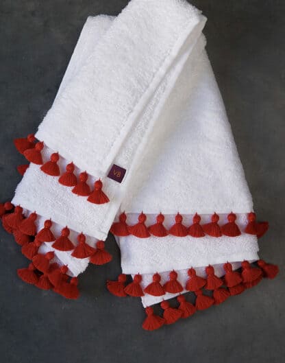 White thick bath linen with hand embroidered red pompoms: LAMU Red