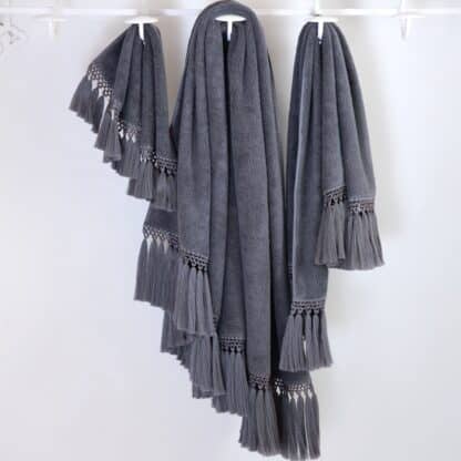 grey terry towel with handmade pompons