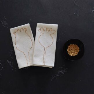 Pair off hand embroidered napkins on ecru cotton