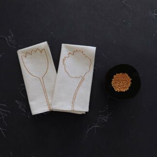 Pair off hand embroidered napkins on ecru cotton