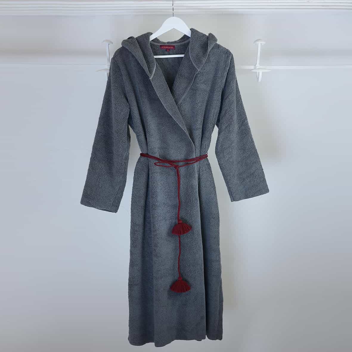 Grey terry bathrobe with carmine pompom by